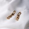 Aretes Unión Modernos